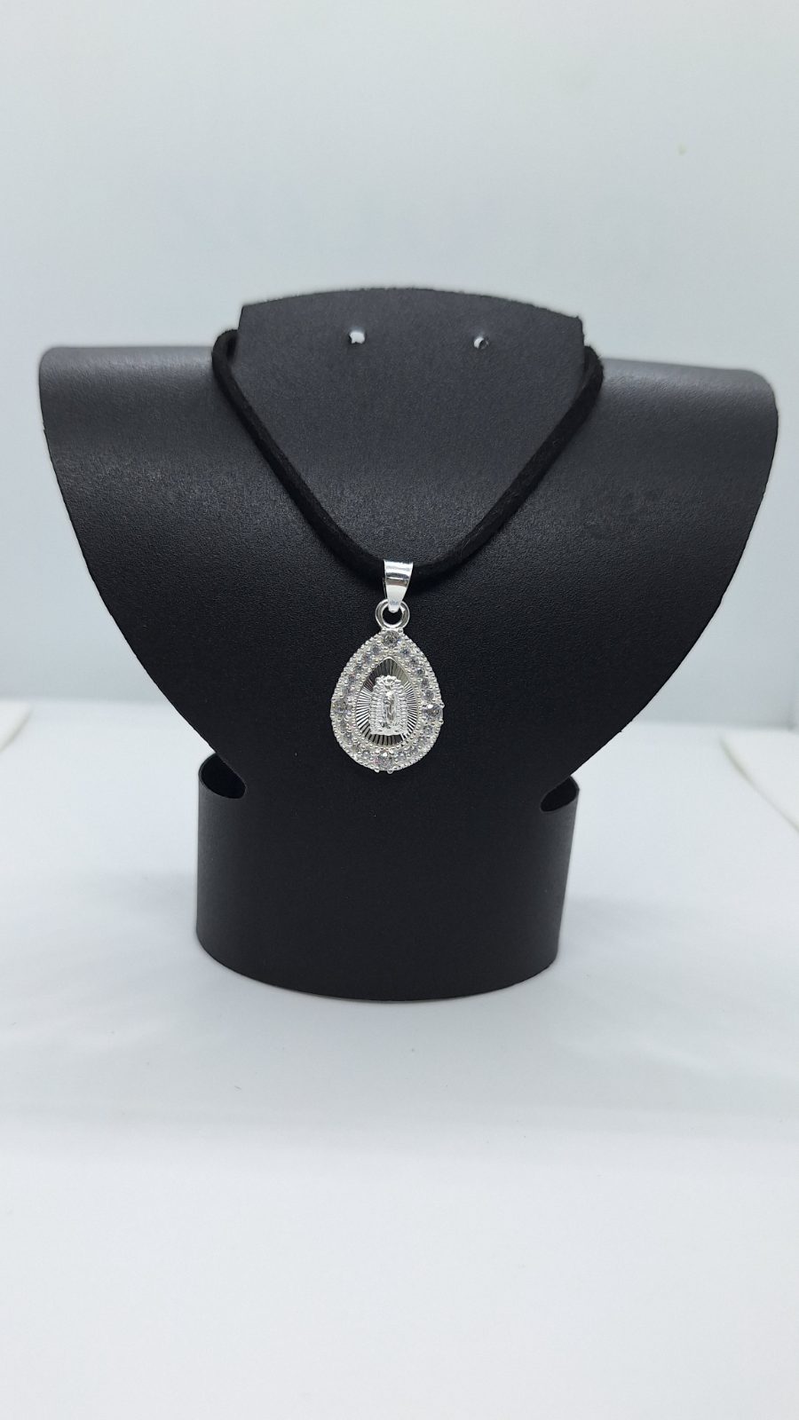 Dije Virgen de Guadalupe gota piedras